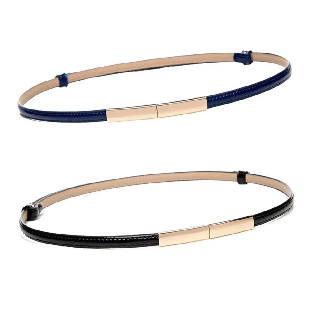 Two slim patent leather belts with gold accents and buckles for stylish accessorizing