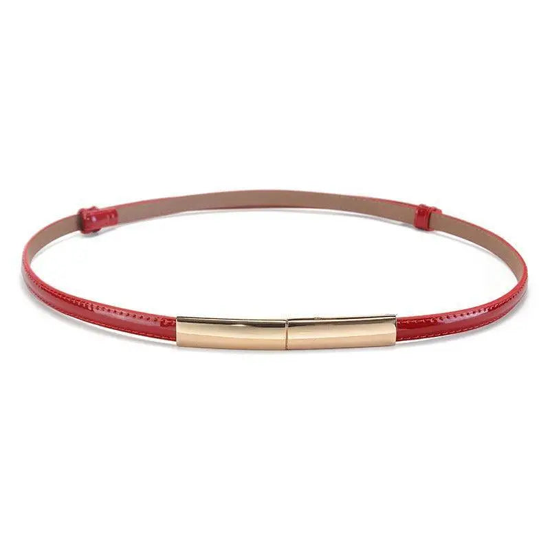 Red patent leather belt with gold buckle from Stacked Patent Leather Belts collection
