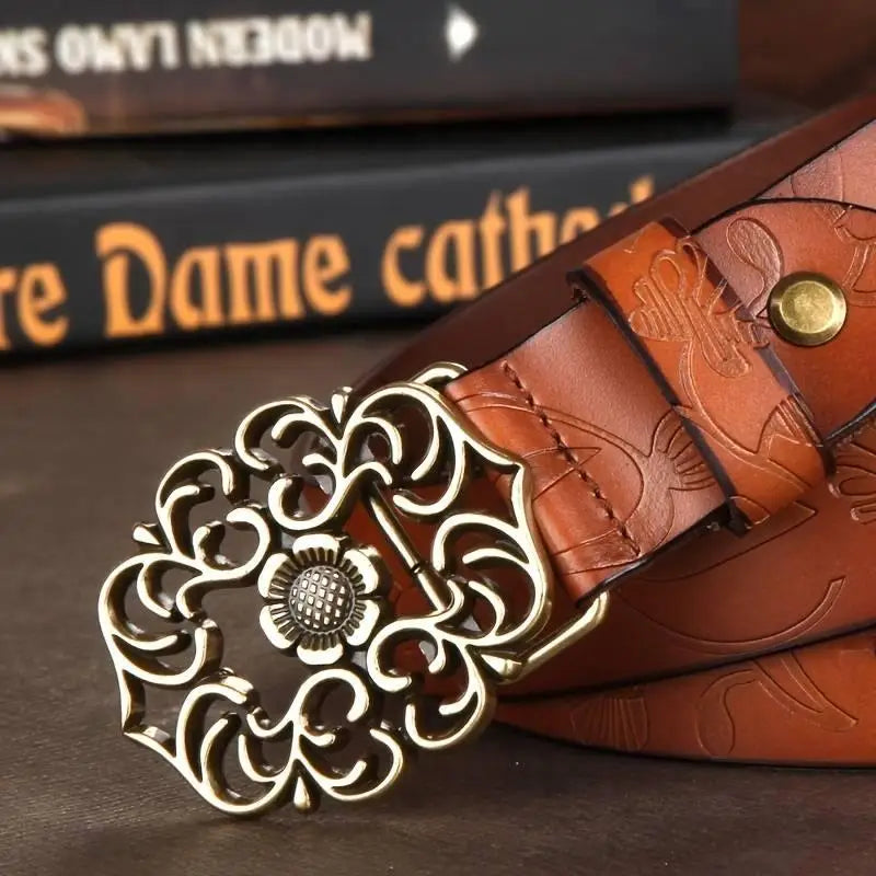 Ornate brown leather belt with detailed buckle from Leather Belts with Ornate Buckles in Red and Brown
