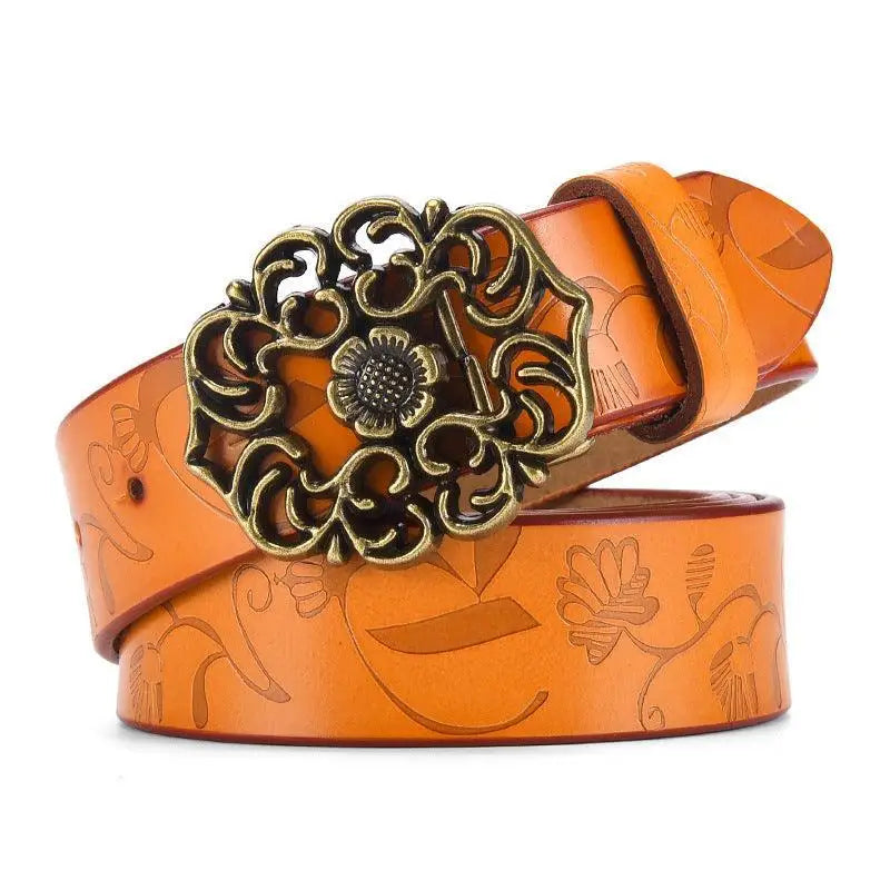 Orange leather belt with floral buckle from Leather Belts with Ornate Buckles in Red and Brown