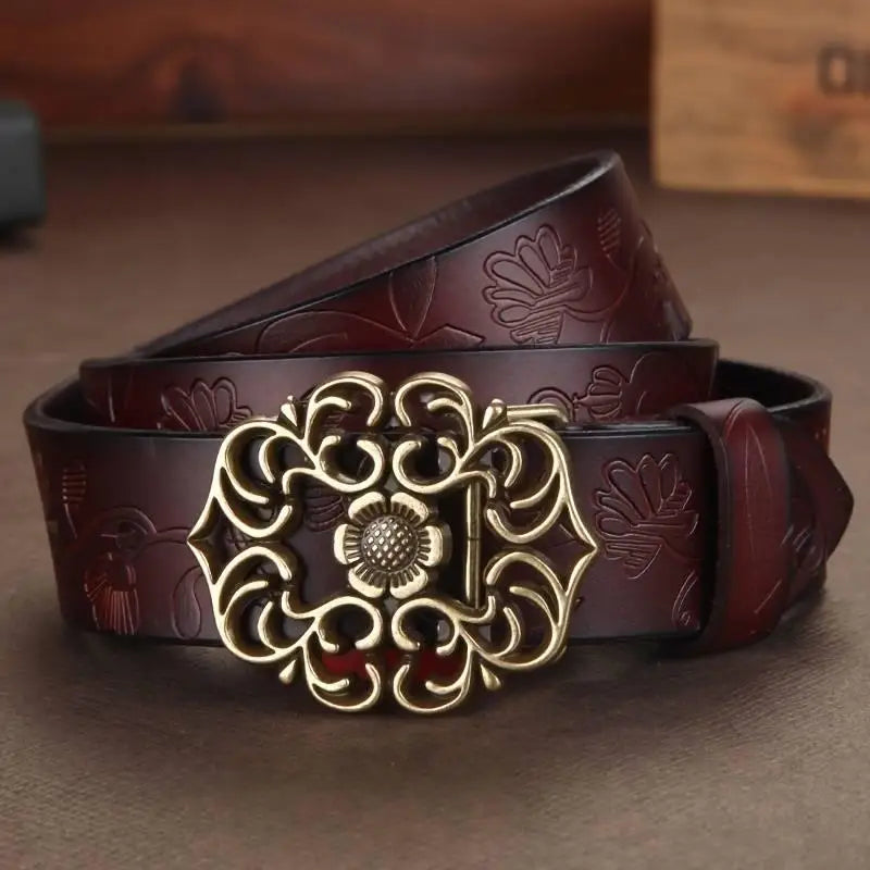 Embossed leather belt with an ornate floral buckle from Leather Belts with Ornate Buckles in Red and Brown