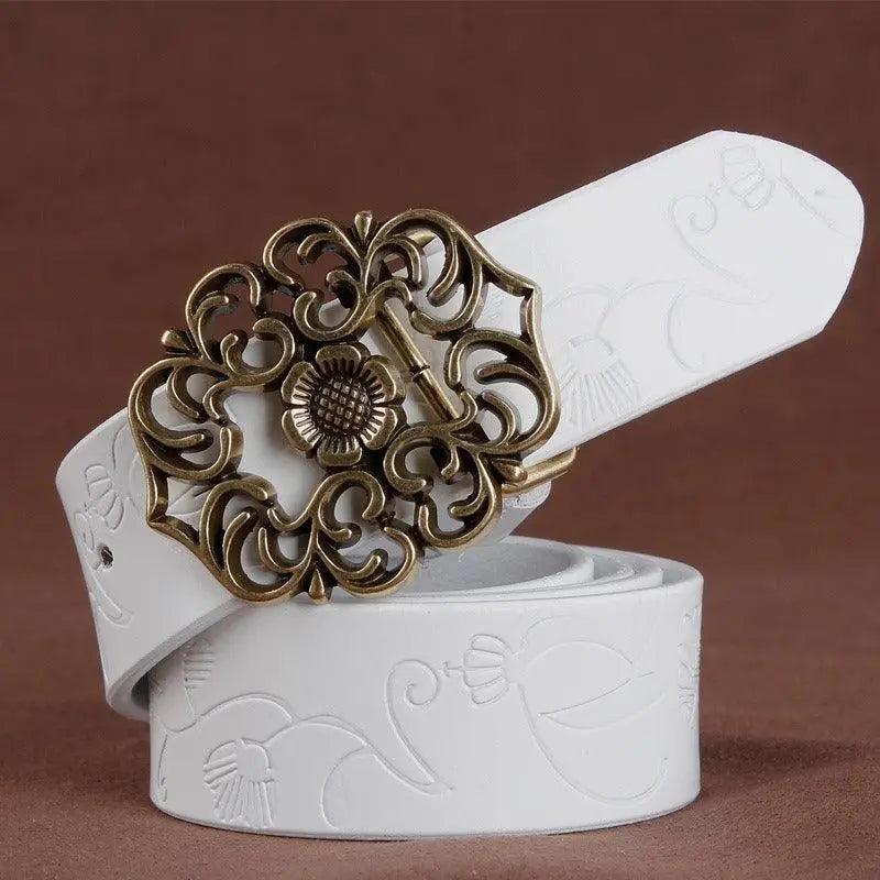 White leather belt with an ornate buckle from Leather Belts with Ornate Buckles in Red and Brown