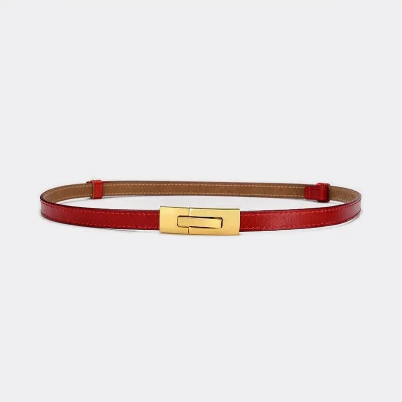 Red leather belt with gold buckle to enhance personal style and fashion elegance