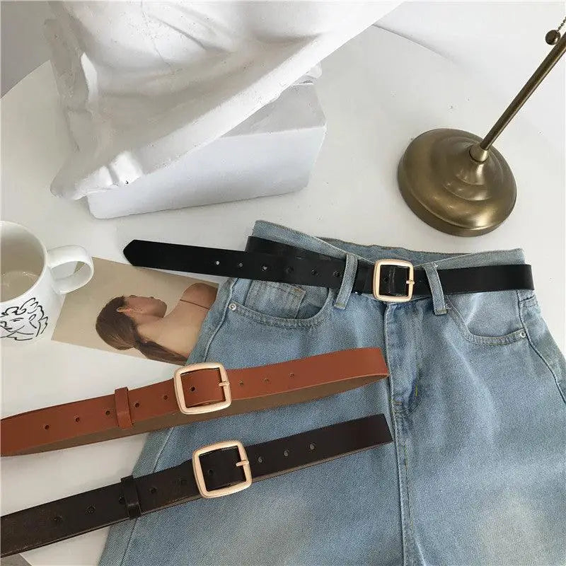 Three leather belts with square gold buckles from Endzela Women’s Belt Collection