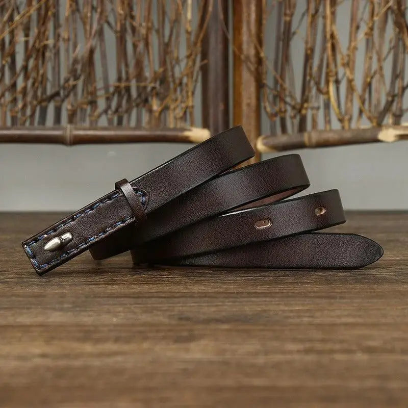 Brown leather belt with stitched edges and a silver buckle for men’s fashion