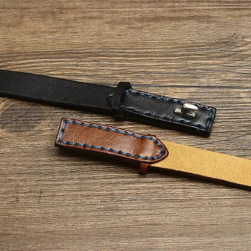 Leather belts with stitched edges and silver buckles displayed in the product image
