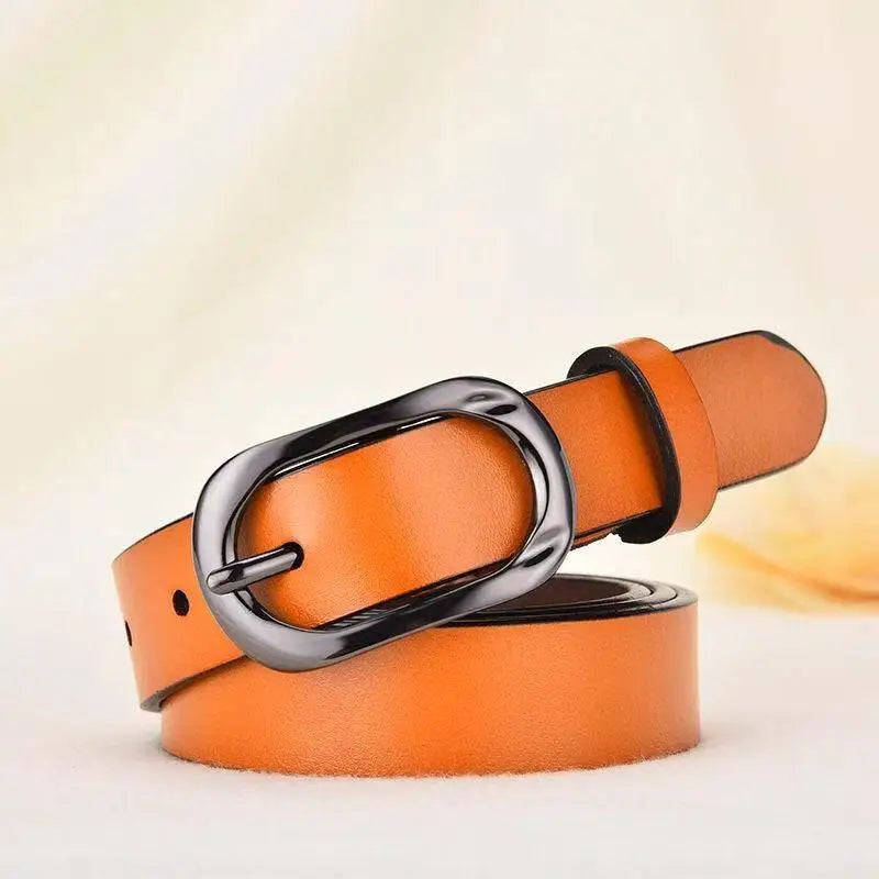 Orange leather belt with a dark metal oval buckle from Leather Belts with Silver and Oval Buckles