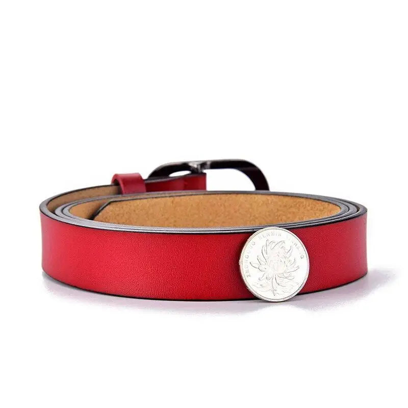 Red leather belt featuring a silver coin and an oval buckle in the Leather Belts with Silver and Oval Buckles collection