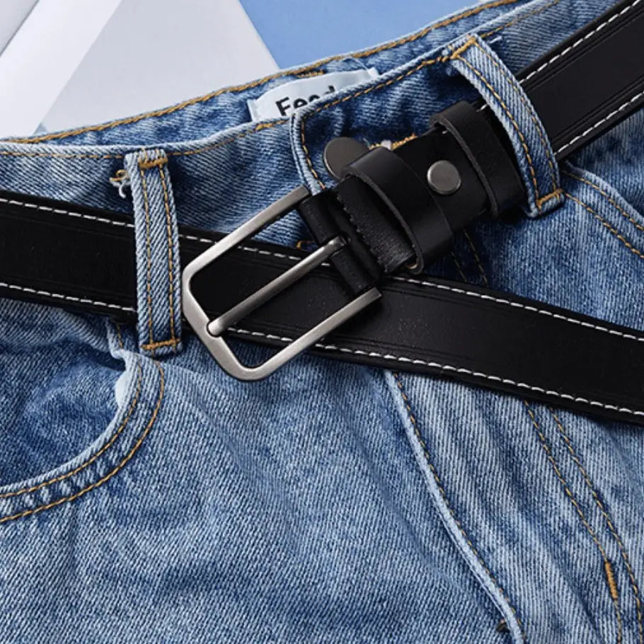 Blue jeans paired with Nestani Leather Belt for Women featuring black leather finish