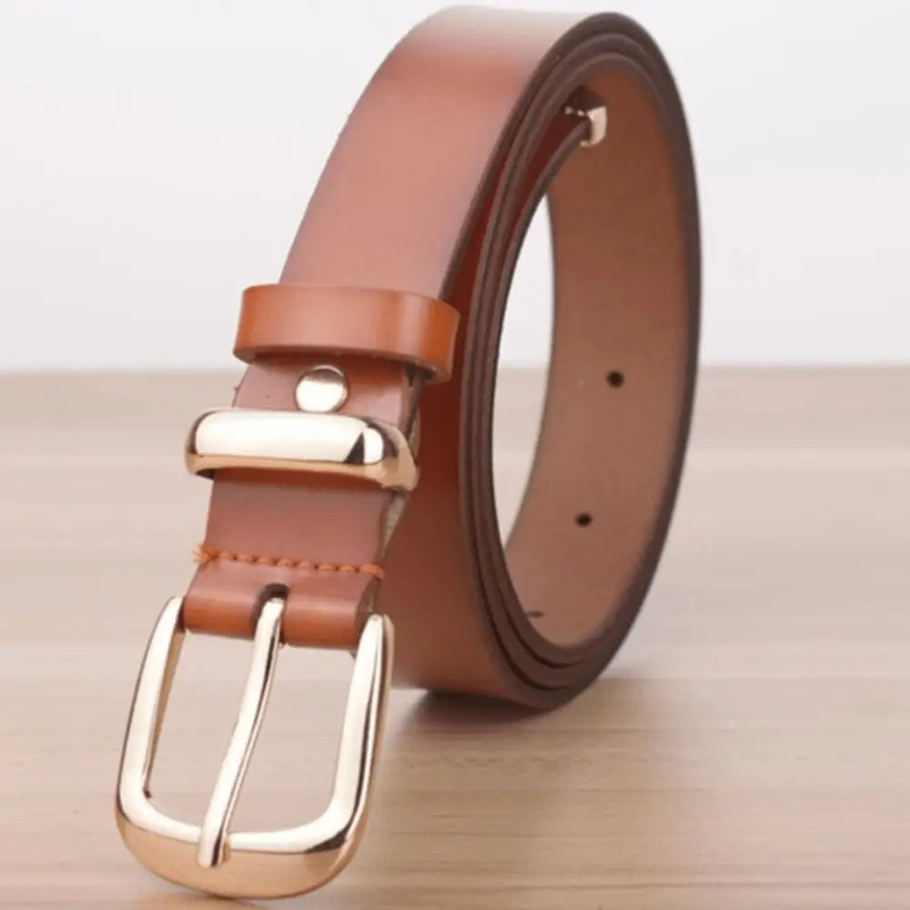 Women’s leather belt with gold buckle for stylish denim accessories