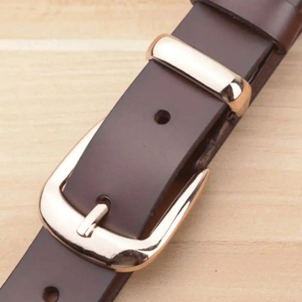 Women’s leather belt with gold buckle for stylish denim accessories