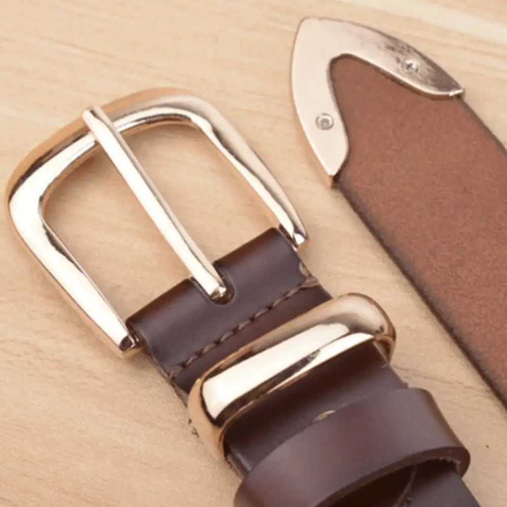 Women’s leather belt with gold buckle and tip for stylish denim accessories