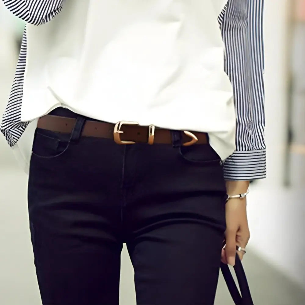 Women’s leather belt with gold buckle for stylish denim accessories