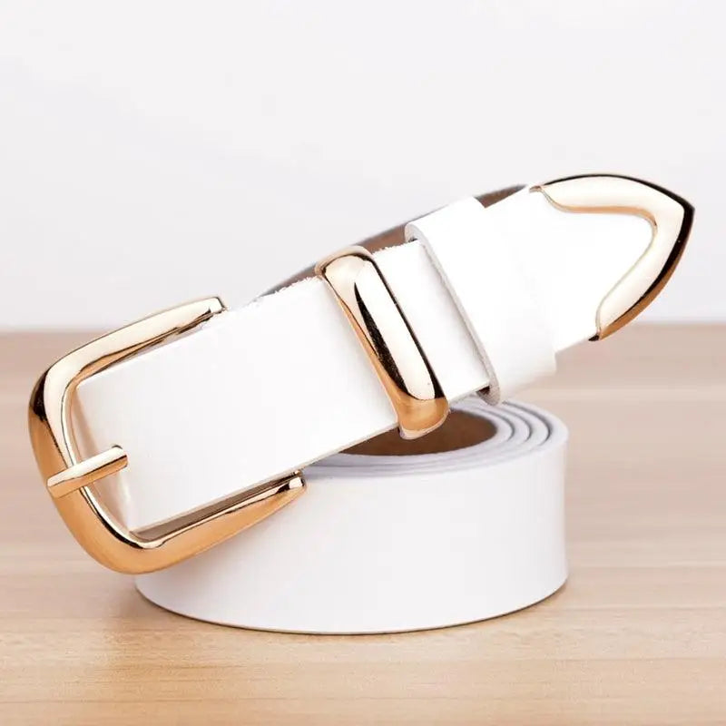 White leather belt with gold buckle displayed on women’s leather belt for stylish denim accessories
