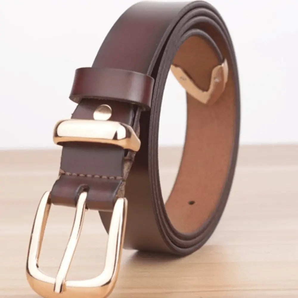 Women’s leather belt with gold buckle for stylish denim accessories