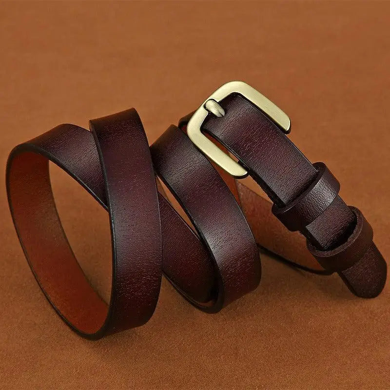 Coiled brown Nurziunia leather belt with brass buckle from the Nurziunia Leather Belt Collection