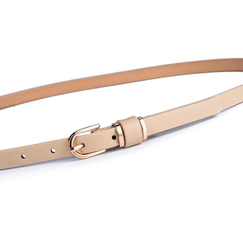 Roxane Leather Belt with gold buckle complements ribbed beige choker-neck sweater
