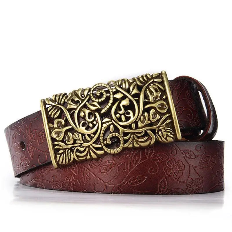 Embossed brown leather belt with an ornate gold metal buckle for women