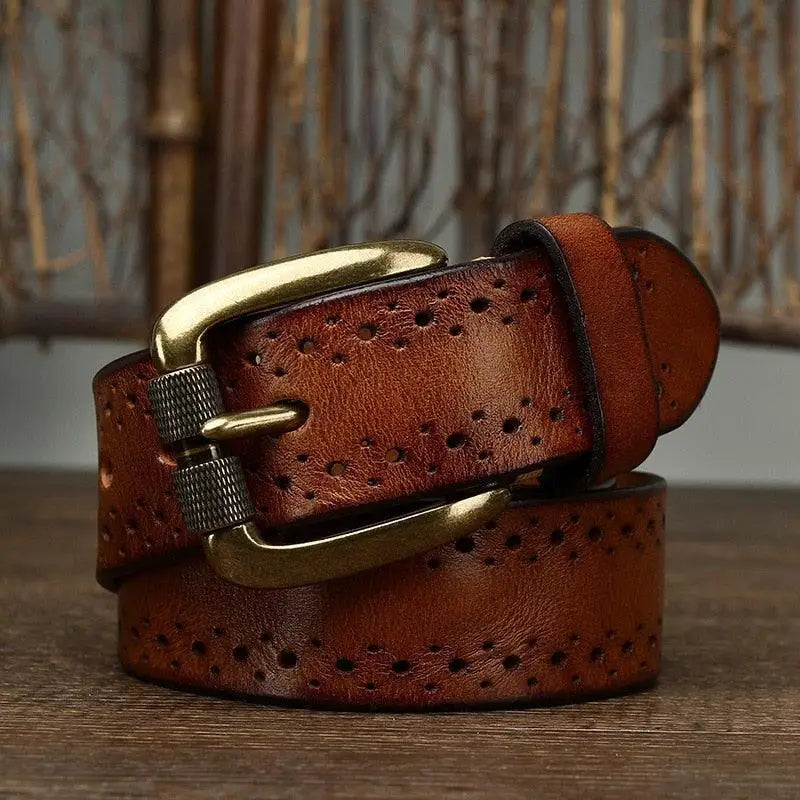 Brown leather belt with a brass buckle from Leather Belts with Decorative Perforations in Brown and Burgundy