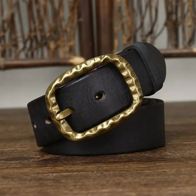 Black leather belt with hammered gold buckle from the Tahirah Model collection