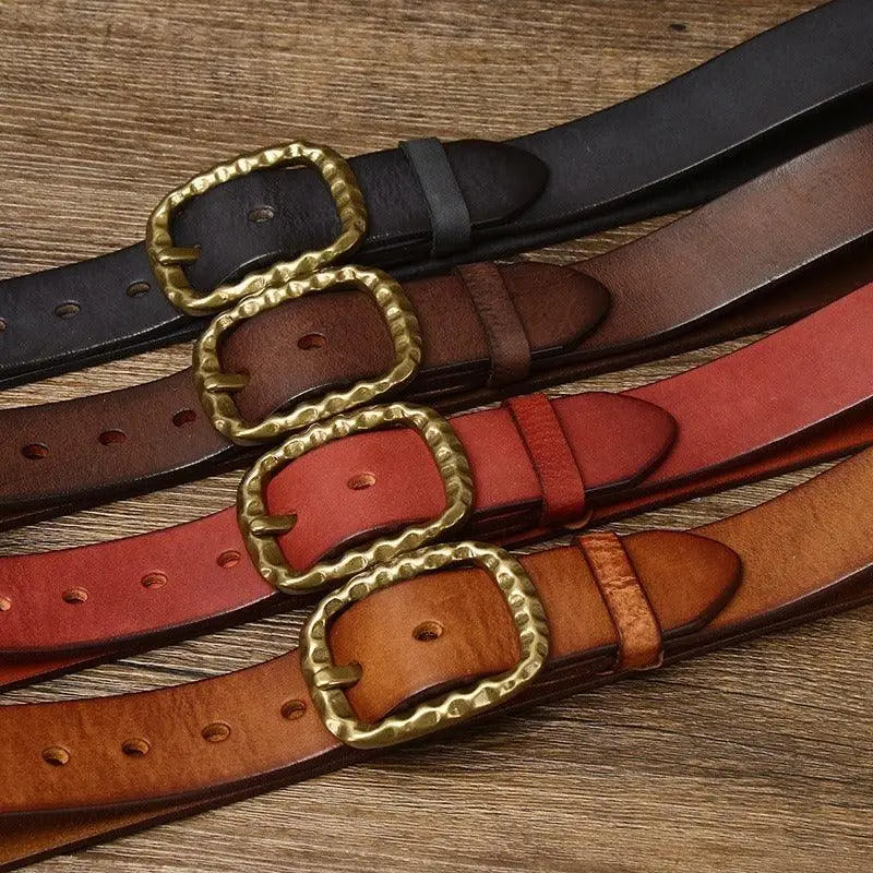 Assorted leather belts with brass buckles including Tahirah Model for stylish accessory options