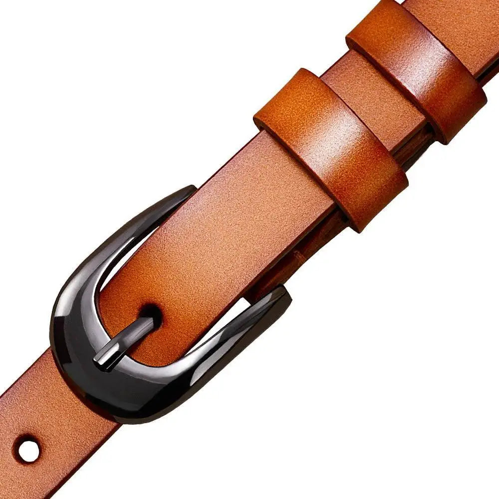 Brown leather belt with decorative cutouts and a black buckle for stylish accessories