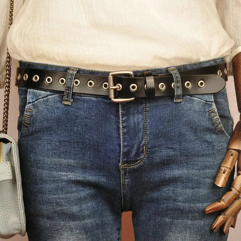 Black grommet belt from Tinatin Leather Belt collection with silver buckle and grommets