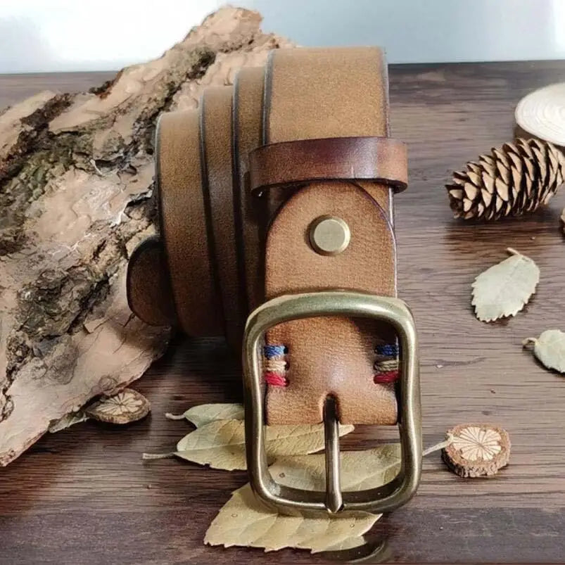 Assorted brown leather belts with brass buckles displayed for stylish accessories