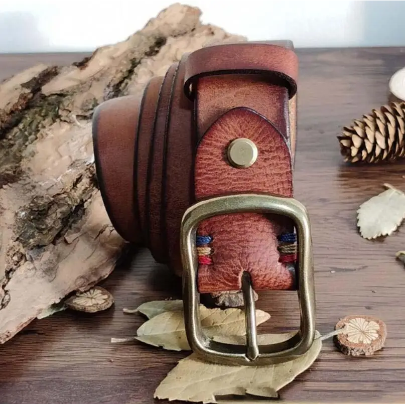 Rolled brown leather belt with a brass buckle from Assorted Brown Leather Belts collection