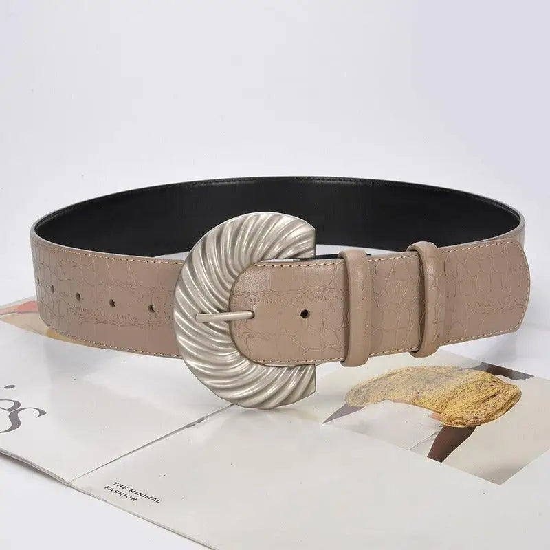 Taupe leather belt with silver buckle from Brown Leather Belt with Silver Buckle and Sherpa Vest Accessory