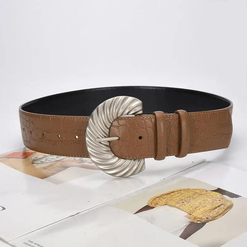 Brown leather belt with silver buckle accessory for Sherpa Vest style product