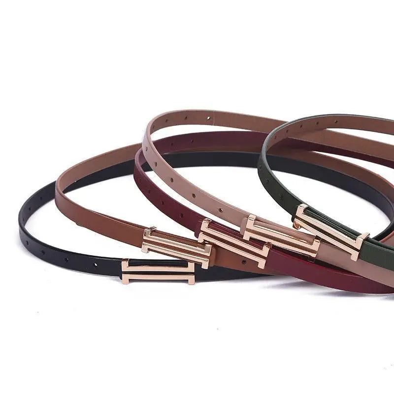 Assorted thin Zaka Women’s Belt collection with gold buckles for elegant style