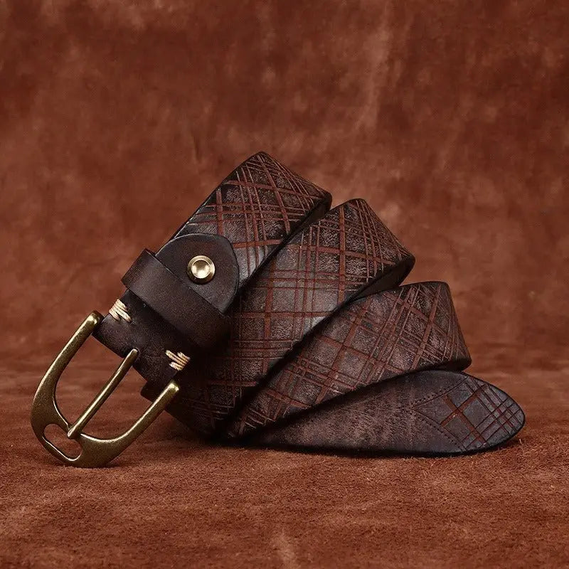 Brown embossed leather belt with patterned design and brass buckle for stylish wear