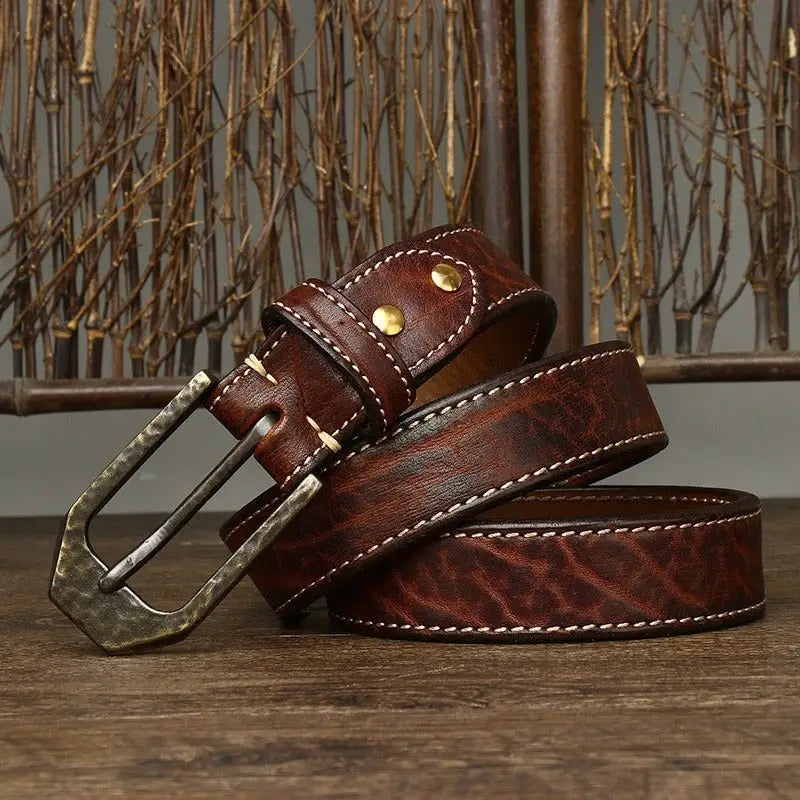 Brown leather belt with decorative metal buckle from Leather Belts with Decorative Metal Buckles