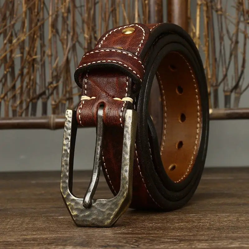 Brown leather belt with a hammered metal buckle from Leather Belts with Decorative Metal Buckles