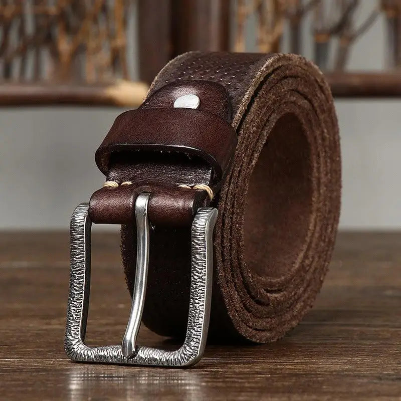 Brown leather belt with textured silver buckle displayed in product Brown Leather Belt with Silver Buckle