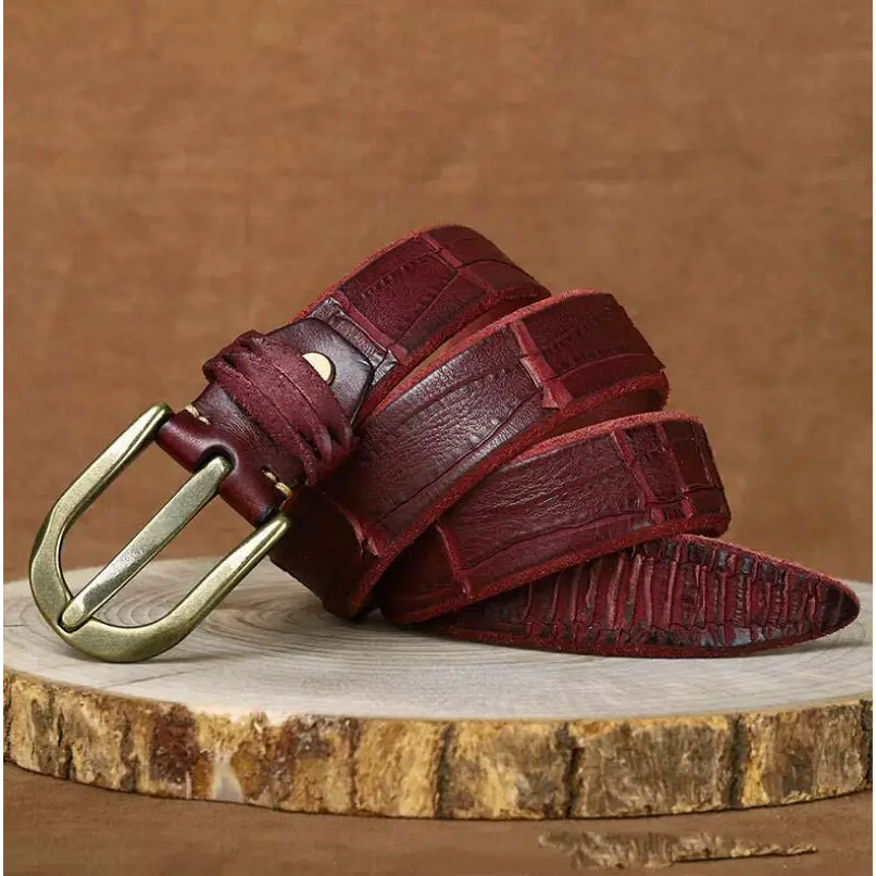 Maroon leather belt with brass buckle showcasing quality craftsmanship