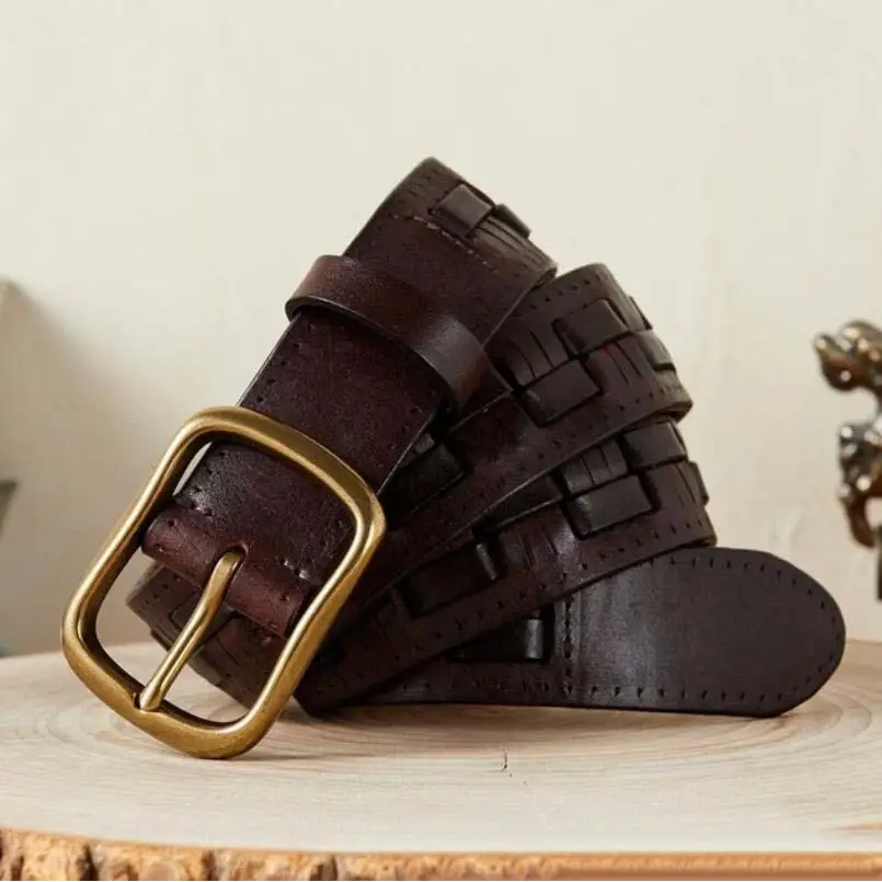 Brown leather belt with brass buckle displayed with Two-Tone Denim Jeans in product image