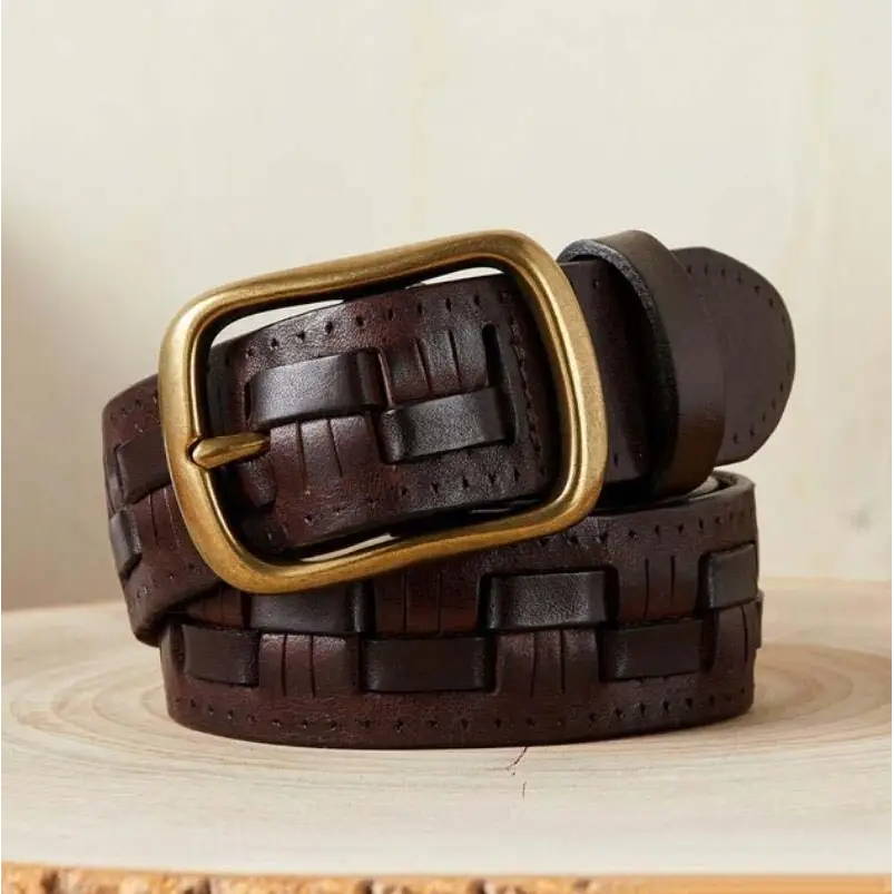 Brown woven leather belt with brass buckle from Assorted Leather Belts and Two-Tone Denim Jeans
