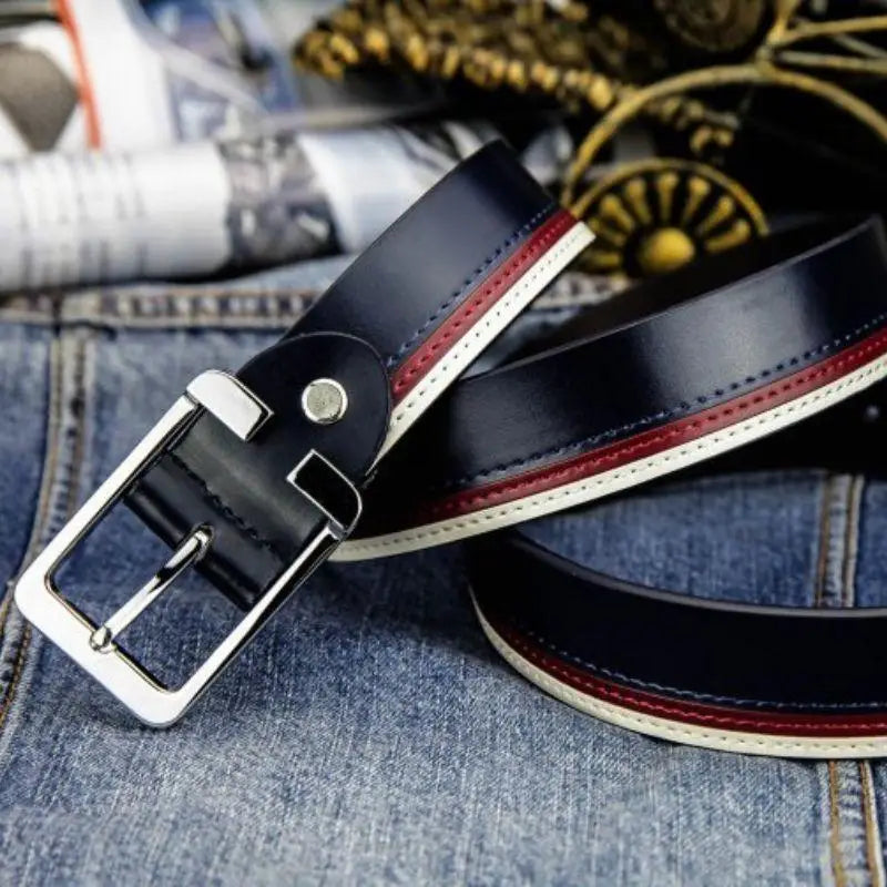 Navy blue leather belt with silver buckle, versatile accessory for stylish outfits