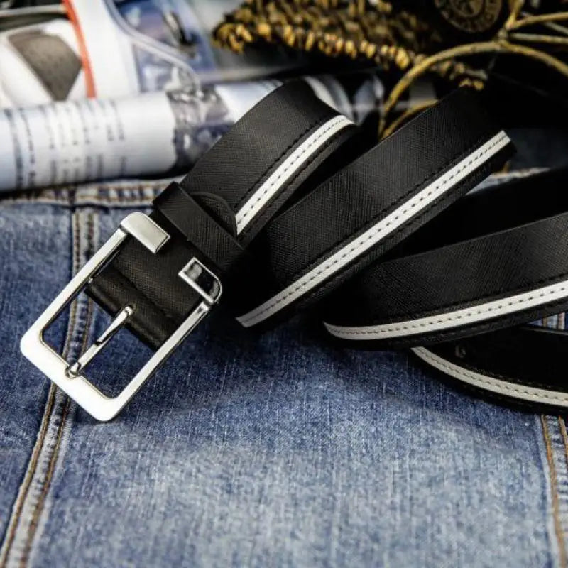 Black leather belt with silver buckle, a versatile accessory for stylish outfits