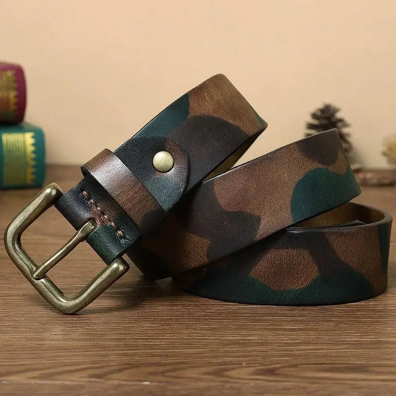 Blue camouflage leather belt with brass buckle and metal closure in close-up view