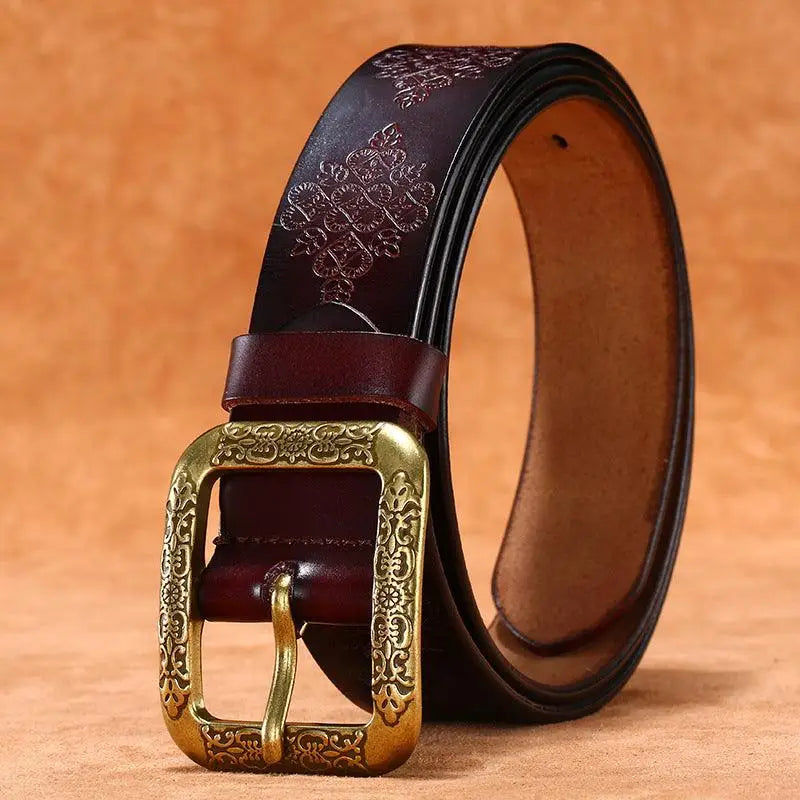 Embossed brown leather belt from Itzel Leather Belt Collection with ornate gold buckle