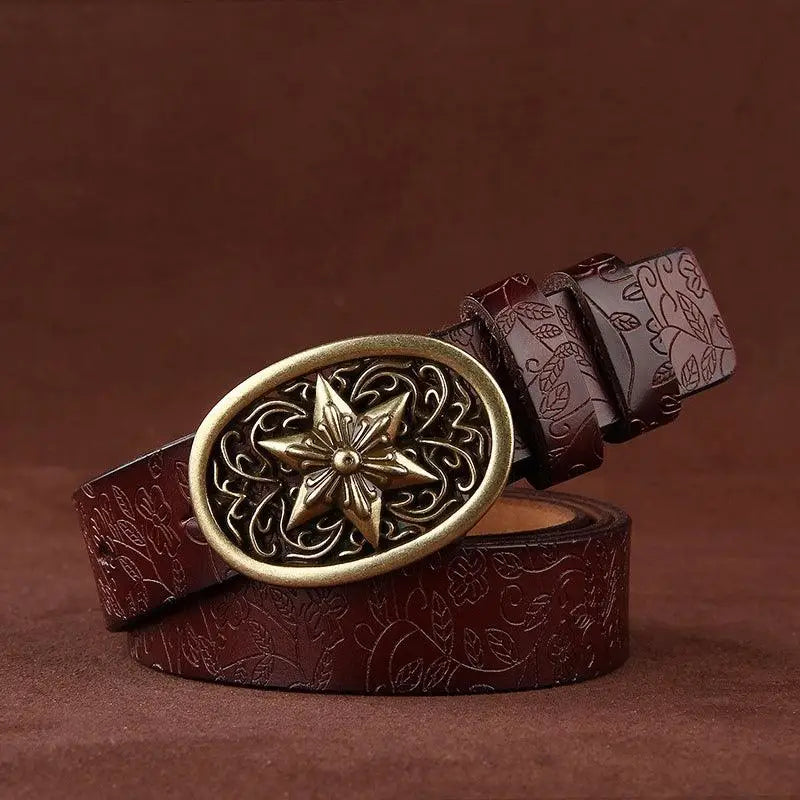 Embossed Sanaa Leather Belt with ornate gold star buckle and floral pattern