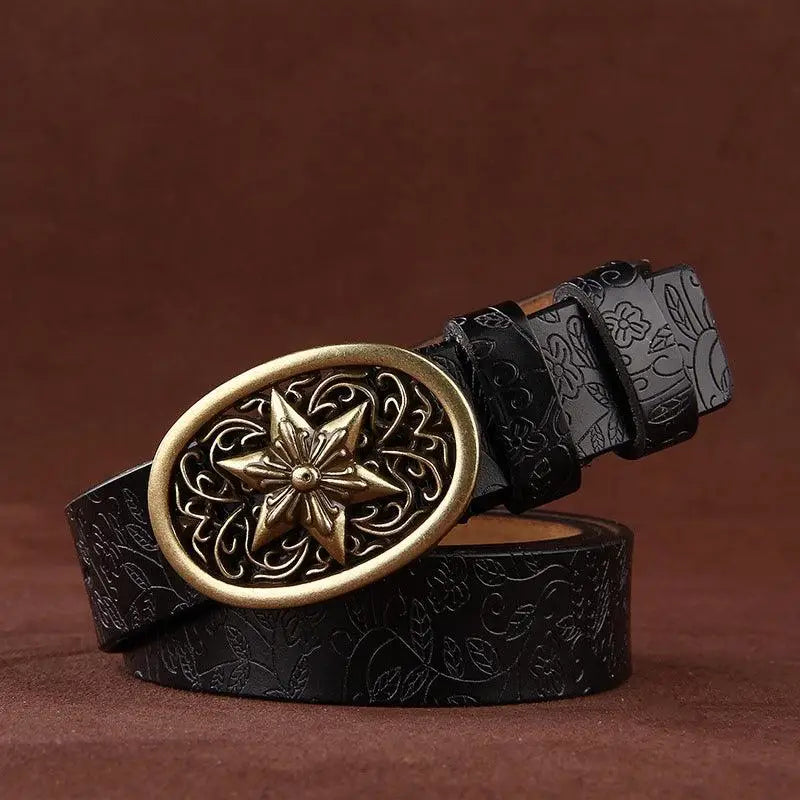 Sanaa Leather Belt featuring an ornate gold star buckle and floral pattern
