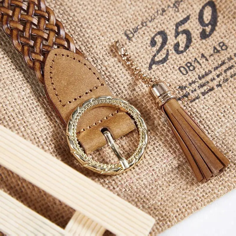 Kara braided leather belt with tassel for stylish accessories featuring braided leather design