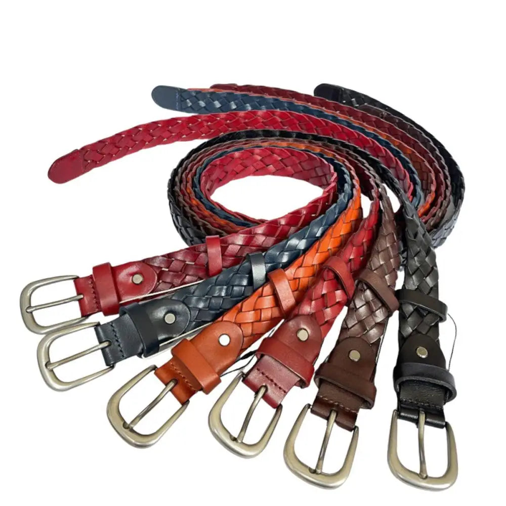 Assorted braided brown leather belts with silver buckles displayed for stylish accessories
