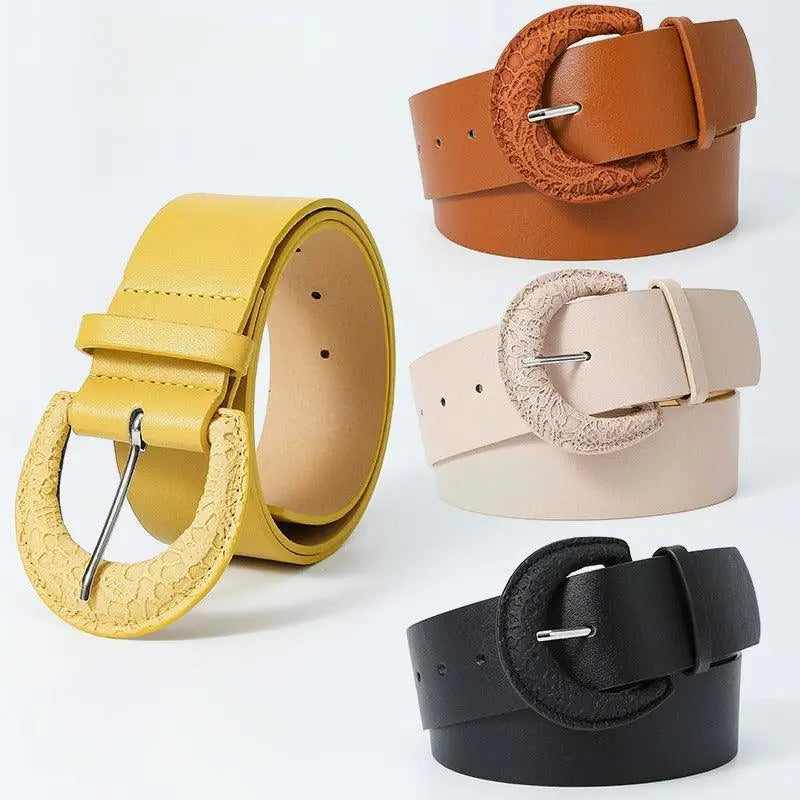 Assorted faux leather wide belts with textured buckle designs for fashion accessories