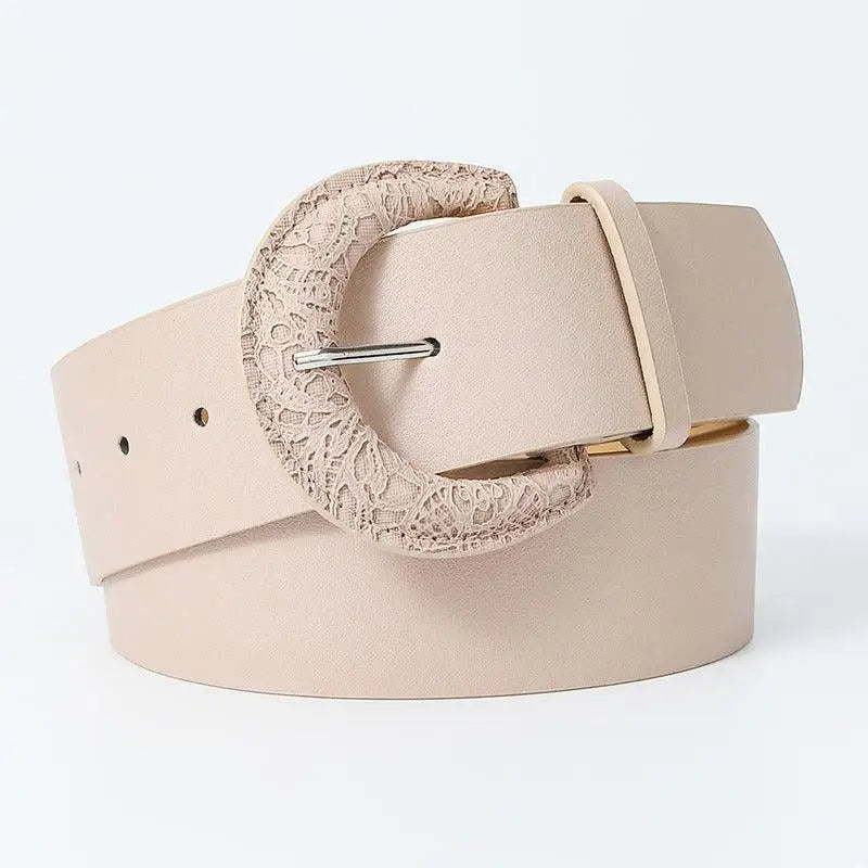 Beige faux leather belt with a decorative textured buckle, part of assorted belt collection