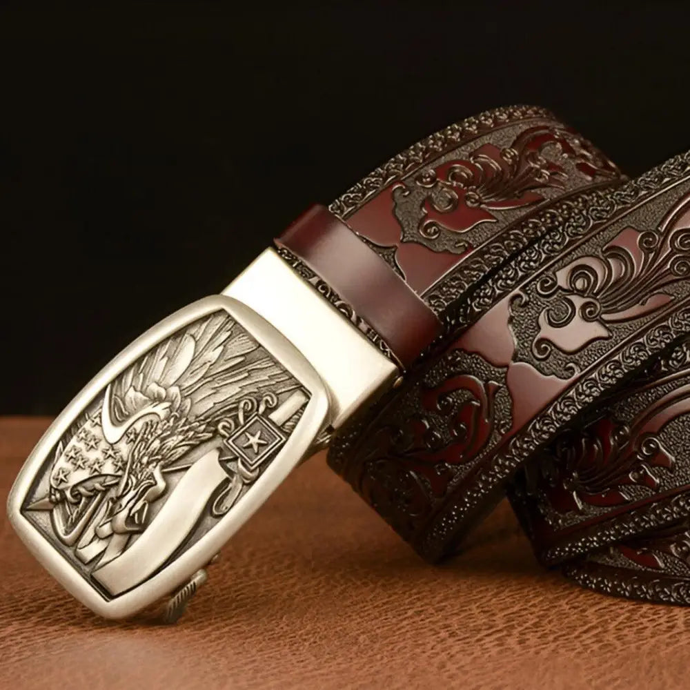 Embossed black leather animal spirit belt with eagle buckle showcasing craftsmanship